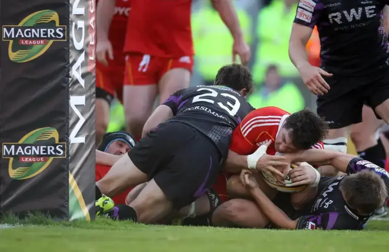 What happens when a player is “held up” in rugby?